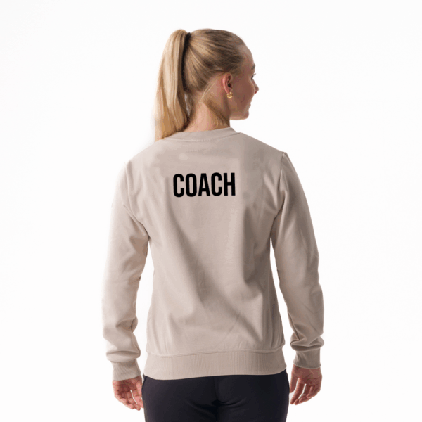 laura_sand_back coach